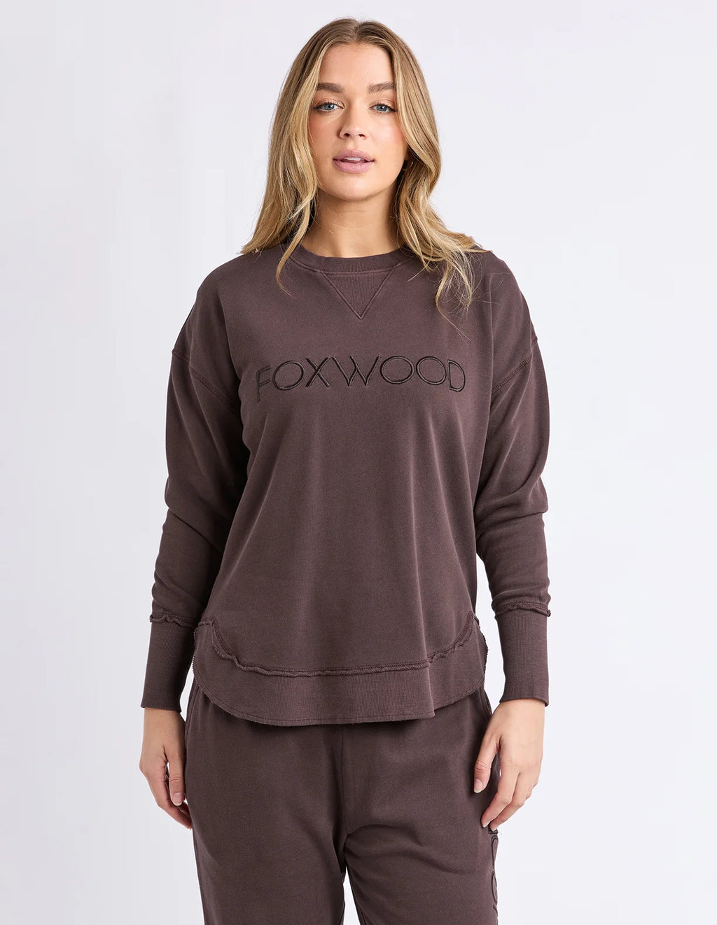 Front chest embroidery
Raw edge detail
Curved hem
100% Cotton