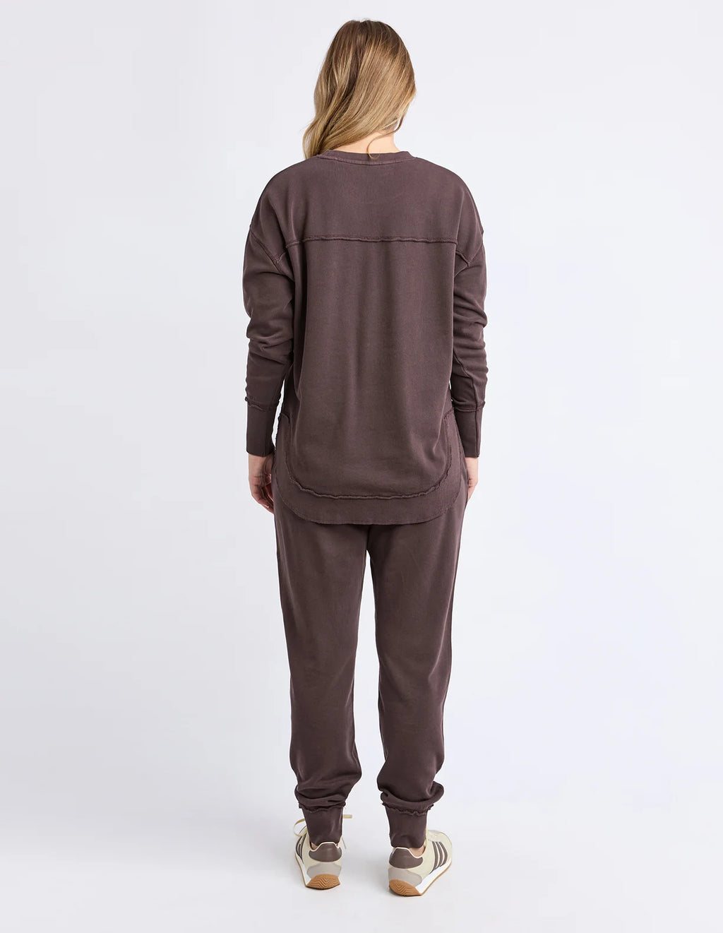 Front chest embroidery
Raw edge detail
Curved hem
100% Cotton