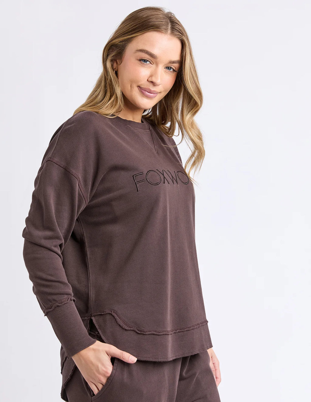 Front chest embroidery
Raw edge detail
Curved hem
100% Cotton