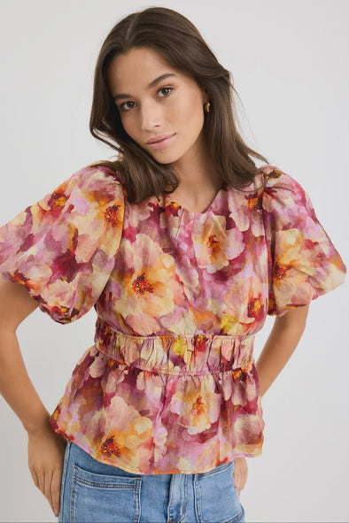 Voluminous bubble short sleeves for a playful, elevated look

Elasticated waist detail for a comfortable, flattering fit

Classic crew neckline for easy styling

Bold pink multi-floral print with painterly detail

Lightweight and breathable for all-day comfort

Fabric: 72% Lyocell, 28% Nylon