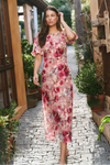 Bias-cut silhouette for beautiful drape and body-skimming shape

Puff sleeves for playful volume and romantic detail

Fully lined for comfort, coverage, and a premium finish

Delicate fabric—best cared for with gentle handling

Painterly rose-floral print for standout style

Fabric: 100% Polyester