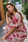 Bias-cut silhouette for beautiful drape and body-skimming shape

Puff sleeves for playful volume and romantic detail

Fully lined for comfort, coverage, and a premium finish

Delicate fabric—best cared for with gentle handling

Painterly rose-floral print for standout style

Fabric: 100% Polyester