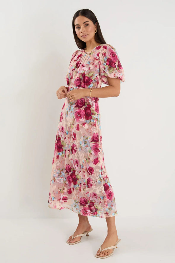 Bias-cut silhouette for beautiful drape and body-skimming shape

Puff sleeves for playful volume and romantic detail

Fully lined for comfort, coverage, and a premium finish

Delicate fabric—best cared for with gentle handling

Painterly rose-floral print for standout style

Fabric: 100% Polyester