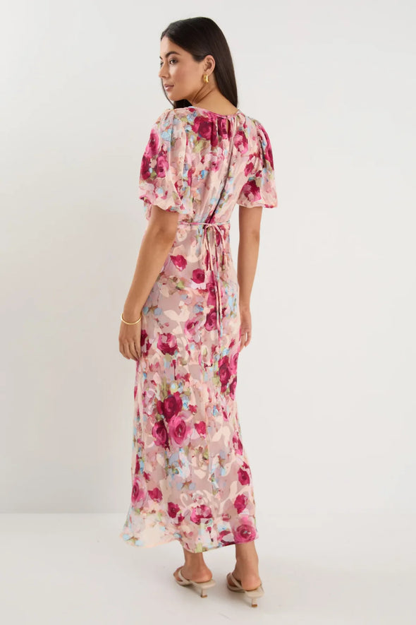 Bias-cut silhouette for beautiful drape and body-skimming shape

Puff sleeves for playful volume and romantic detail

Fully lined for comfort, coverage, and a premium finish

Delicate fabric—best cared for with gentle handling

Painterly rose-floral print for standout style

Fabric: 100% Polyester