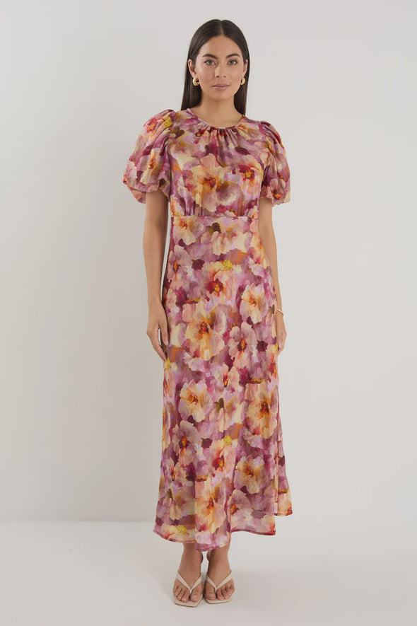 Bias-cut silhouette for a flattering drape and elegant movement

Puff sleeves for romantic shape and soft volume

Fully lined for added comfort and confidence

Statement painterly floral print

Delicate fabric—handle with care

Fabric Composition: 72% Lyocell, 28% Nylon