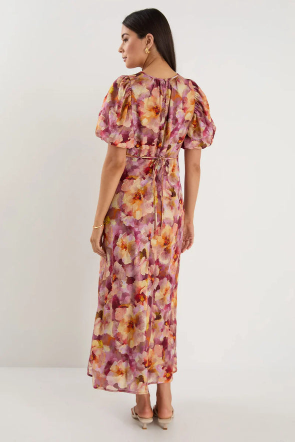 Bias-cut silhouette for a flattering drape and elegant movement

Puff sleeves for romantic shape and soft volume

Fully lined for added comfort and confidence

Statement painterly floral print

Delicate fabric—handle with care

Fabric Composition: 72% Lyocell, 28% Nylon