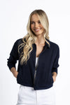 The Cruise Jacket is a lightweight, year-round essential crafted from 100% Lyocell — a soft, breathable, and eco-friendly fabric. This classic zip-up style features full-length sleeves with band cuffs, elasticised cotton trims, and practical front pockets. Designed to sit at the hip, it’s the perfect go-to jacket for everyday layering.