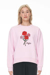 Get ready for the arrival of Spring with this adorable crew. Featuring embroidered flowers and Huffer branding, along with a cozy fleece lining. The blossom colour option is a beautiful shade of pink that will brighten up your day. This everyday piece can be effortlessly paired with denim, workout fit, or for a comfortable yet stylish relaxed look. The ribbed crew neck, cuff, and hem, along with the dropped shoulder, add to the relaxed fit.