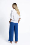 Crafted from a breathable, eco-friendly linen, cotton ramie, and tencel blend

Flattering V-neckline with self-covered button closure

Pintuck detailing on shoulders for subtle texture

Roomy sleeves with trim and elastic cuffs for versatile styling

Relaxed fit pairs easily with jeans, shorts, or linen pants