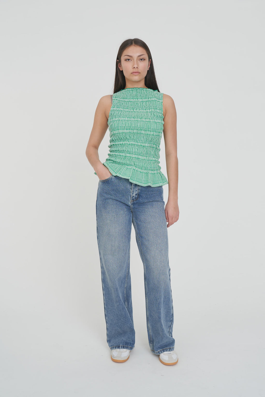 Shirred bodice for a comfy, flexible fit
Cute ruffle hem for a feminine finish
Sleeveless silhouette
Easy crew neckline
Perfect for work, weekends and everything in between