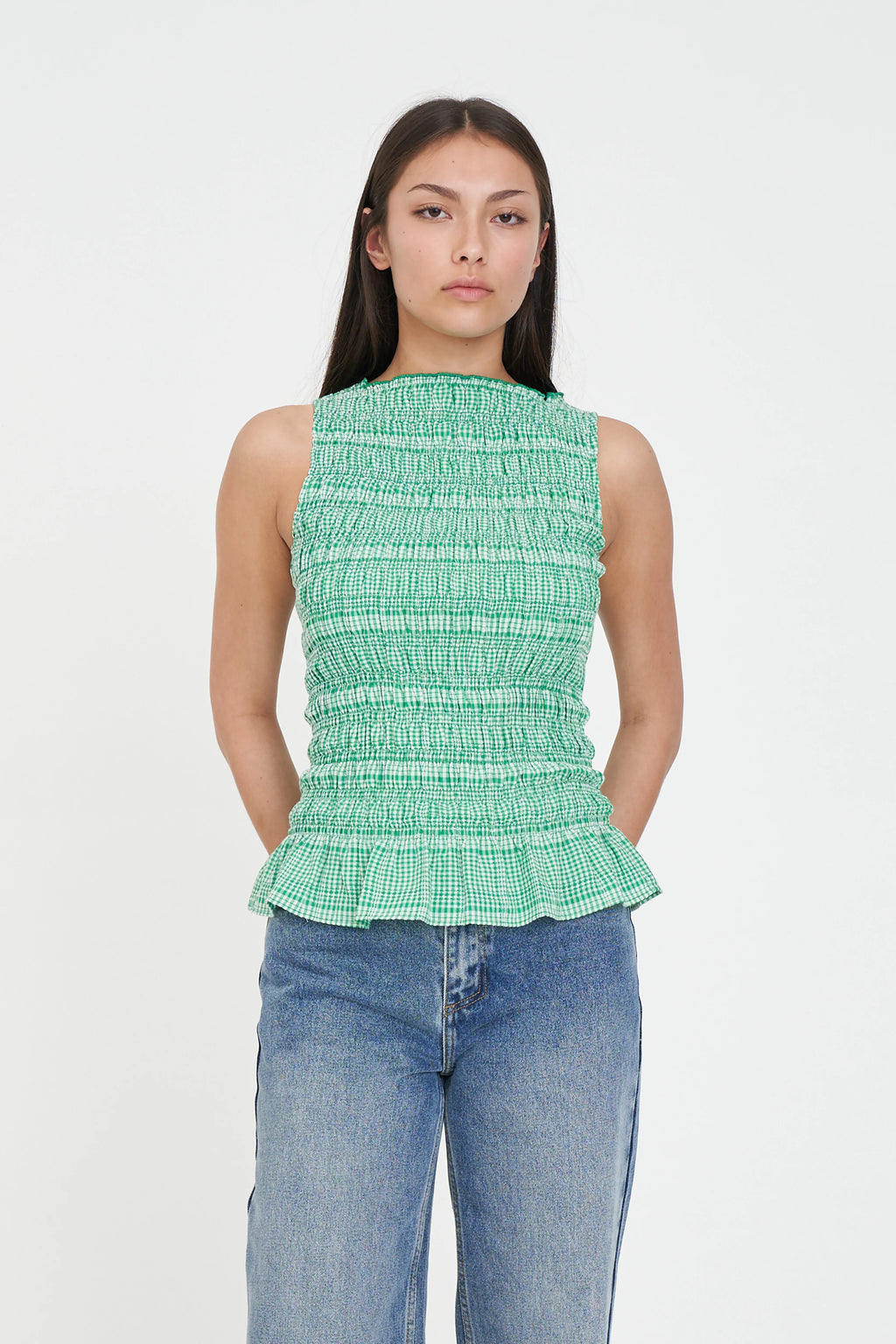 Shirred bodice for a comfy, flexible fit
Cute ruffle hem for a feminine finish
Sleeveless silhouette
Easy crew neckline
Perfect for work, weekends and everything in between