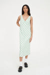Refresh your wardrobe with the effortlessly chic Celine Midi Dress. A modern take on classic gingham, this piece features a fresh Matcha green and white diagonal check that feels both sophisticated and playful.