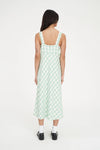Refresh your wardrobe with the effortlessly chic Celine Midi Dress. A modern take on classic gingham, this piece features a fresh Matcha green and white diagonal check that feels both sophisticated and playful.