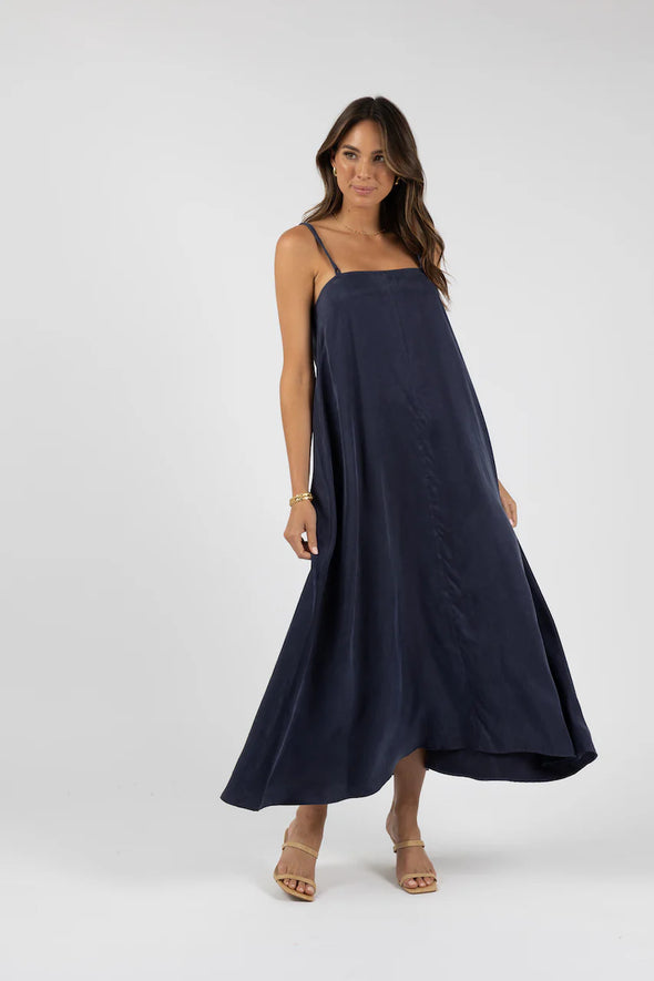 Elevate your summer style with our Cupro Collection. Our unique Cupro fabric offers a soft, velvety texture for an effortless touch of class. Perfect for all your festive and new year celebrations, this maxi dress features a stunning resort design that will also travel well.