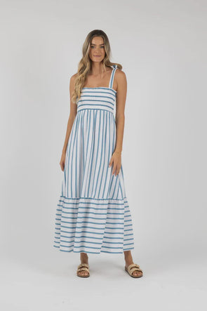 Introducing the Santos Shirred Dress, your new go-to maxi for effortless style. Crafted with our unique Humidity woven design and adjustable self-fabric straps for a bra-friendly fit, it flatters all body types with a shirred elastic bodice and frilled hem. Made of soft cotton and featuring a stunning contrast woven stripe, this dress is both chic and comfortable. Plus, it's maternity-friendly for added versatility.