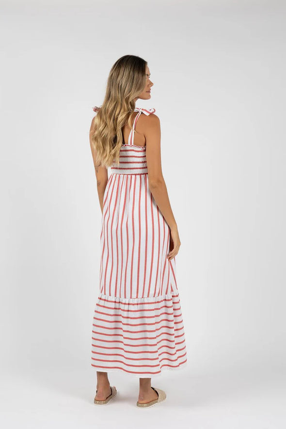 Introducing the Santos Shirred Dress, your new go-to maxi for effortless style. Crafted with our unique Humidity woven design and adjustable self-fabric straps for a bra-friendly fit, it flatters all body types with a shirred elastic bodice and frilled hem. Made of soft cotton and featuring a stunning contrast woven stripe, this dress is both chic and comfortable. Plus, it's maternity-friendly for added versatility.