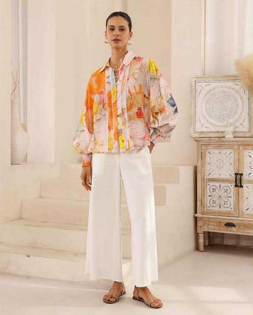 Say hello to sunshine in a blouse — The Marigold Blouse is a true standout, made to brighten your wardrobe and your day.