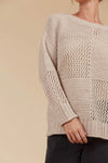 Wide round neck
Drop shoulder
Long sleeves
Hip-length
Contrasting weave design
Easy fit
80% Acrylic, 20% Wool