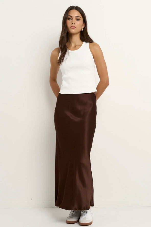 - Pull-on style with comfortable elastic waist
- Bias cut creates a softly draped silhouette
- Chocolate hue in silky rayon-viscose blend
- Midi length offers versatile styling options
- Delicate fabric with a luxurious silky feel, 60% Rayon, 40% Viscose