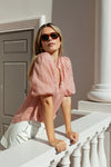 High neck blouse with frill detailing

Elegant button front design

Mid-length balloon sleeves for a feminine touch

Semi-sheer 100% Ramie fabric – lightweight and breathable

Effortless styling from day to night