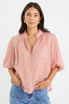 High neck blouse with frill detailing

Elegant button front design

Mid-length balloon sleeves for a feminine touch

Semi-sheer 100% Ramie fabric – lightweight and breathable

Effortless styling from day to night