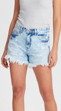 The famous Sofia shorts by Junkfood are always a fast seller and a real favourite. Perfectly distressed and a mid rise these look great fitted or looser and lower on the waist. Rigid but soft denim shorts with ripped front panels and a raw hem.

Fixed waist band with belt loops, 100% cotton, zip fly, classic 5 pocket design. Rips and holes will naturally continue to grow.