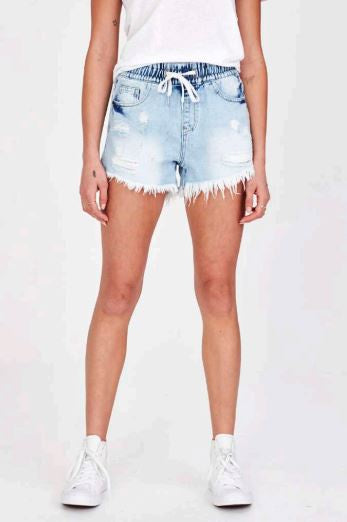 Rigid denim frayed shorts with an elastic waist band and shoe string tie. In the perfect faded light blue.

Can be worn higher or lower on the waist as preferred. Medium length with good coverage.