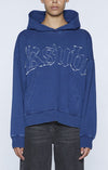 Ksubi's Indigo Scribe Slouch Hoodie brings you cult comfort in a cotton-poly French terry hoodie with a playful touch of fading throughout. Features a cool logo appliqué on the front and back, plus a convenient kangaroo pocket. Rib knit accents on the hem and cuffs add an extra pop, while dropped shoulders keep things relaxed. Supplier color: Indigo. Made from 86% cotton, 12% polyester, and 2% spandex for ultimate comfort.