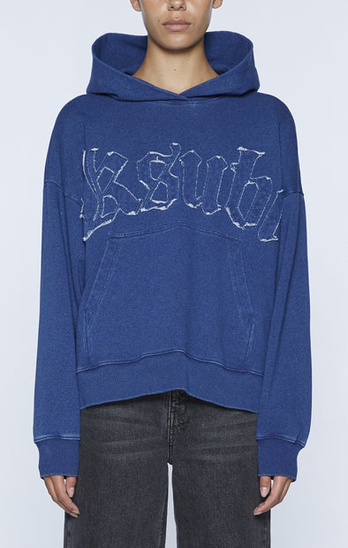 Ksubi's Indigo Scribe Slouch Hoodie brings you cult comfort in a cotton-poly French terry hoodie with a playful touch of fading throughout. Features a cool logo appliqué on the front and back, plus a convenient kangaroo pocket. Rib knit accents on the hem and cuffs add an extra pop, while dropped shoulders keep things relaxed. Supplier color: Indigo. Made from 86% cotton, 12% polyester, and 2% spandex for ultimate comfort.