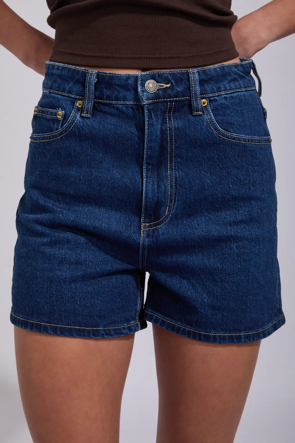 High-rise fit

Relaxed A-line shape

Zip fly closure

Finished hem (can be rolled)

Contrast stitching &amp; silver metal trims

Vegan faux leather patch

99.5% Cotton, 0.5% Elastane