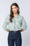 Pretty sage-green base with white bloom print

Relaxed, easy fit

Elbow-length sleeves

Lightweight and breathable

Perfect for pairing with jeans or summer skirts

Composition: 70% Viscose, 30% Nylon