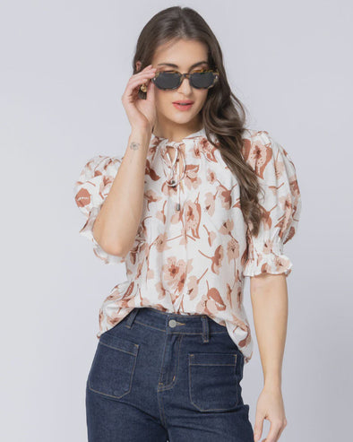 Soft and feminine, the Leila + Luca Honey Blouse in Latte Bloom is the perfect piece to dress up or down. With its light floral print, relaxed fit, and flattering silhouette, it’s ideal for pairing with jeans for a casual weekend look or tailoring for the office. A versatile wardrobe staple that works across every season.