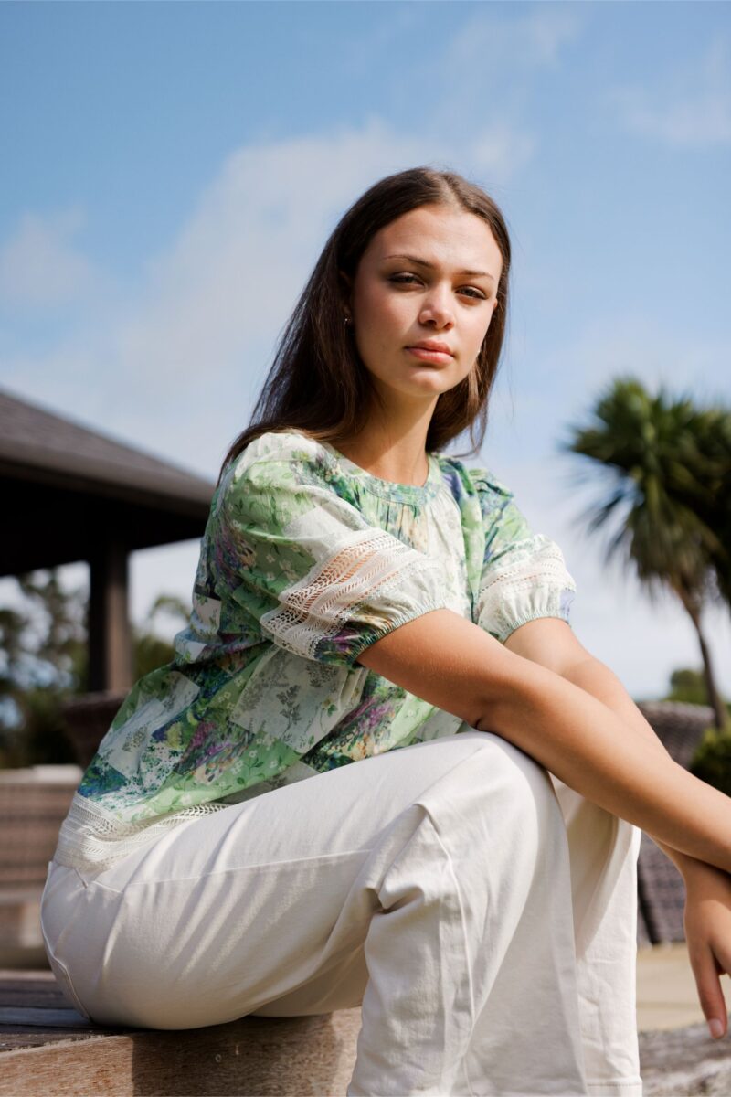 Soft green patchwork-inspired floral print
Gathered neckline
Relaxed, feminine silhouette
Lace trim sleeve detailing
Lightweight and breathable 100% cotton
100% Cotton