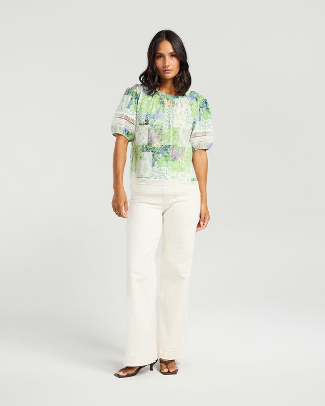 Soft green patchwork-inspired floral print
Gathered neckline
Relaxed, feminine silhouette
Lace trim sleeve detailing
Lightweight and breathable 100% cotton
100% Cotton
