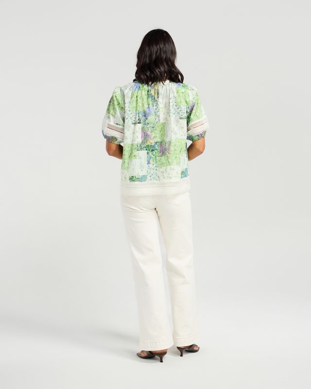 Soft green patchwork-inspired floral print
Gathered neckline
Relaxed, feminine silhouette
Lace trim sleeve detailing
Lightweight and breathable 100% cotton
100% Cotton