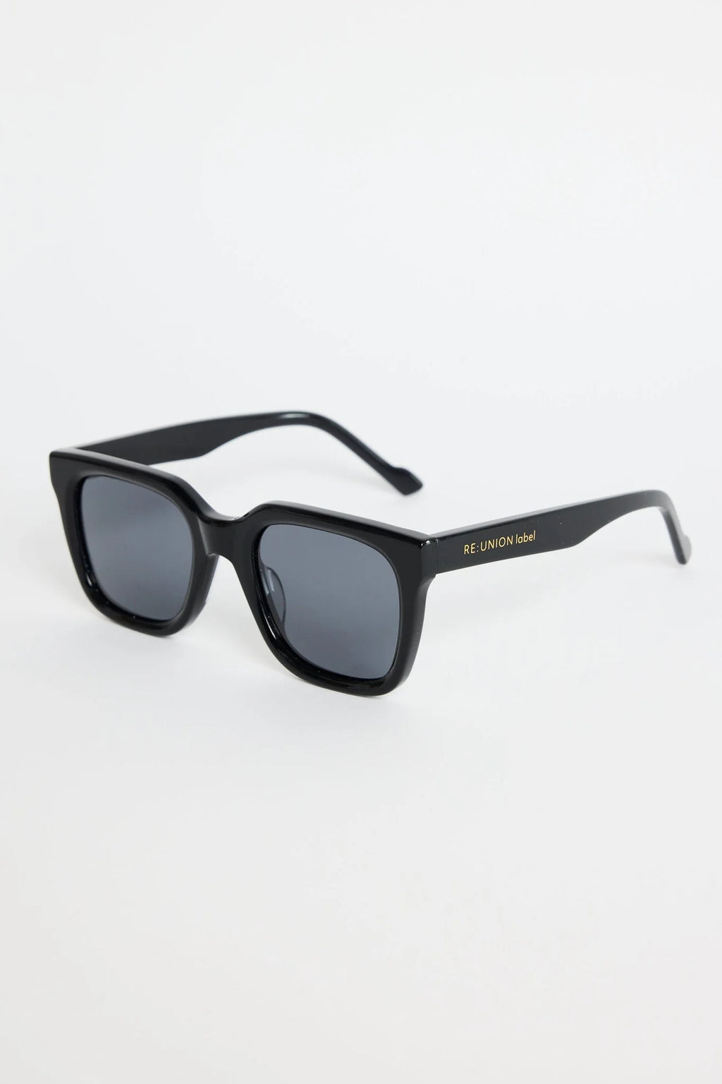 The Napoli Black Rounded Sunglasses bring a sleek, modern edge to your everyday look. Designed with a bold square-rounded silhouette, this glossy black frame strikes the perfect balance between minimal and statement. The dark tinted lenses keep things clean and refined, making this pair an easy go-to for sunny days, city strolls, and weekend outfits.

A timeless essential that instantly sharpens your style.

- Recycled Acetate

- UV Protection Category 3