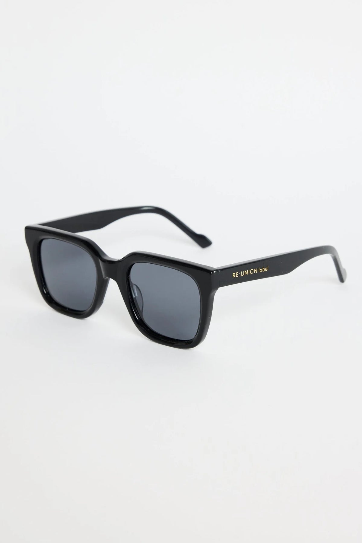 The Napoli Black Rounded Sunglasses bring a sleek, modern edge to your everyday look. Designed with a bold square-rounded silhouette, this glossy black frame strikes the perfect balance between minimal and statement. The dark tinted lenses keep things clean and refined, making this pair an easy go-to for sunny days, city strolls, and weekend outfits.

A timeless essential that instantly sharpens your style.

- Recycled Acetate

- UV Protection Category 3