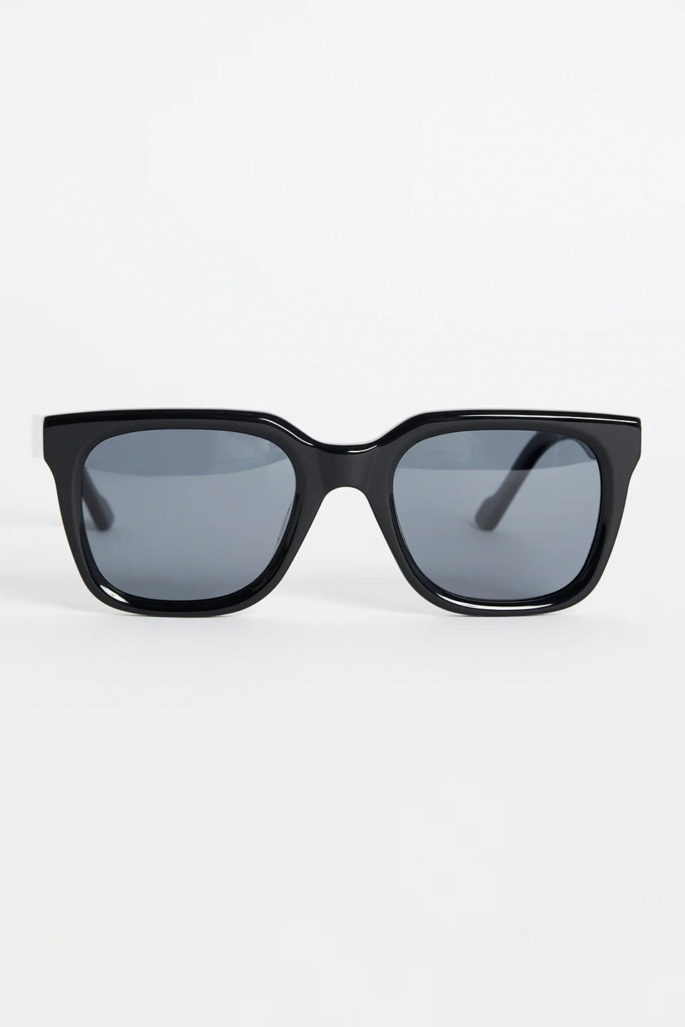 The Napoli Black Rounded Sunglasses bring a sleek, modern edge to your everyday look. Designed with a bold square-rounded silhouette, this glossy black frame strikes the perfect balance between minimal and statement. The dark tinted lenses keep things clean and refined, making this pair an easy go-to for sunny days, city strolls, and weekend outfits.

A timeless essential that instantly sharpens your style.

- Recycled Acetate

- UV Protection Category 3
