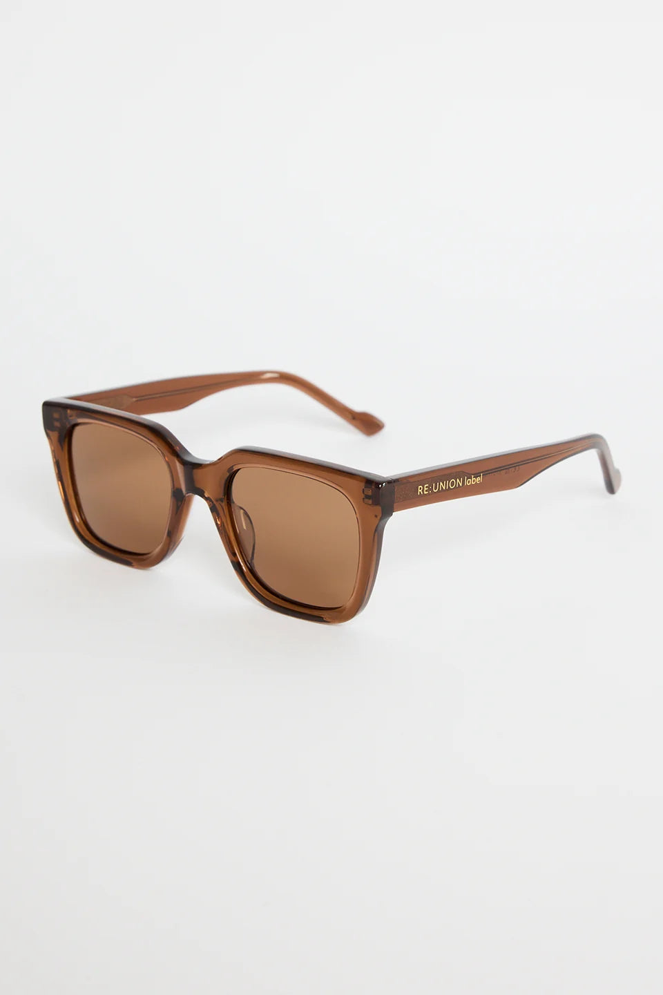 The Napoli Espresso Rounded Sunglasses bring a warm, modern feel to your everyday rotation. Designed in a rich espresso tone, the softly rounded square frame creates a sleek, flattering silhouette that suits every outfit. Finished with matching brown lenses for a cohesive, elevated look, this pair is all about understated cool and easy styling.

A timeless essential you’ll reach for season after season.

- Recycled Acetate

- UV Protection Category 3