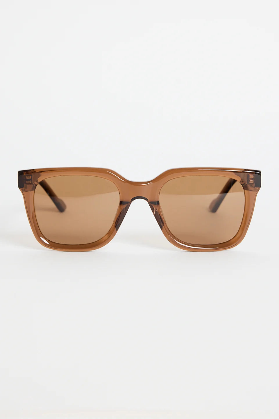 The Napoli Espresso Rounded Sunglasses bring a warm, modern feel to your everyday rotation. Designed in a rich espresso tone, the softly rounded square frame creates a sleek, flattering silhouette that suits every outfit. Finished with matching brown lenses for a cohesive, elevated look, this pair is all about understated cool and easy styling.

A timeless essential you’ll reach for season after season.

- Recycled Acetate

- UV Protection Category 3