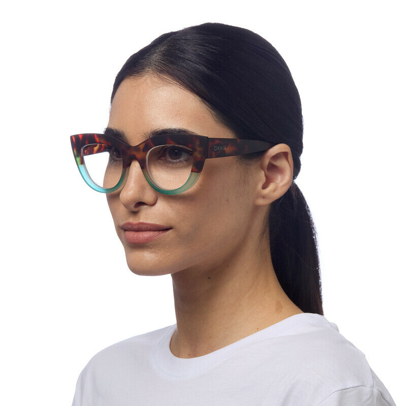 Category: Reading Glasses

Frame colour: Havana and Blue

Iconic Cat Eye silhouette with raised corners and large lenses

Crafted with OKKIA’s signature soft-touch material for comfort

Designed for clarity, comfort, and timeless style