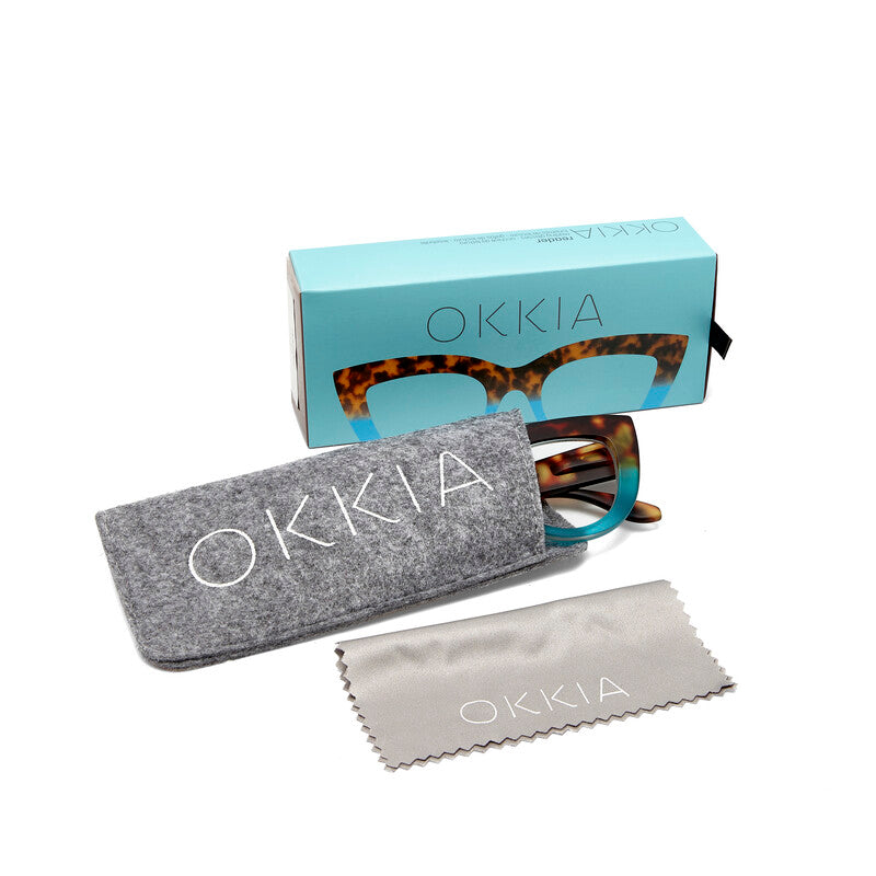 Category: Reading Glasses

Frame colour: Havana and Blue

Iconic Cat Eye silhouette with raised corners and large lenses

Crafted with OKKIA’s signature soft-touch material for comfort

Designed for clarity, comfort, and timeless style