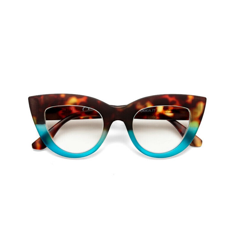 Category: Reading Glasses

Frame colour: Havana and Blue

Iconic Cat Eye silhouette with raised corners and large lenses

Crafted with OKKIA’s signature soft-touch material for comfort

Designed for clarity, comfort, and timeless style