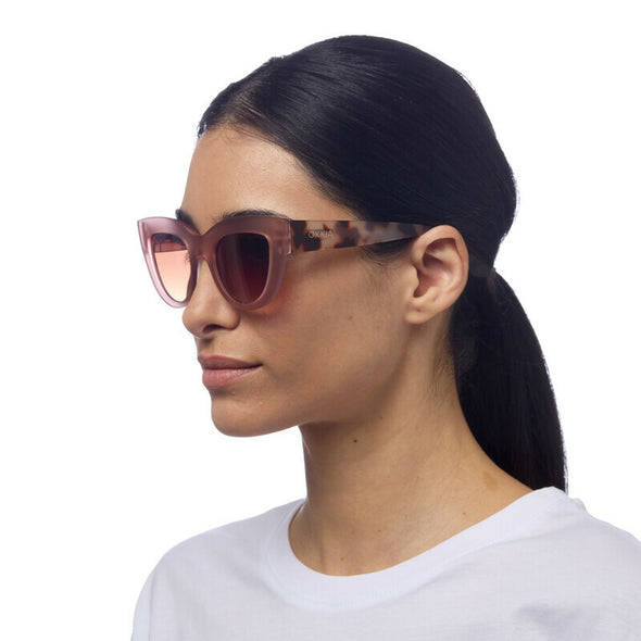 Frame colour: Pink Havana

Lens colour: Brown Gradient

Light Filter Category 3 (8–18% transmission) — ideal for bright sunlight

UV400 protection for complete eye safety

Signature Cat Eye silhouette with raised corners and large lenses