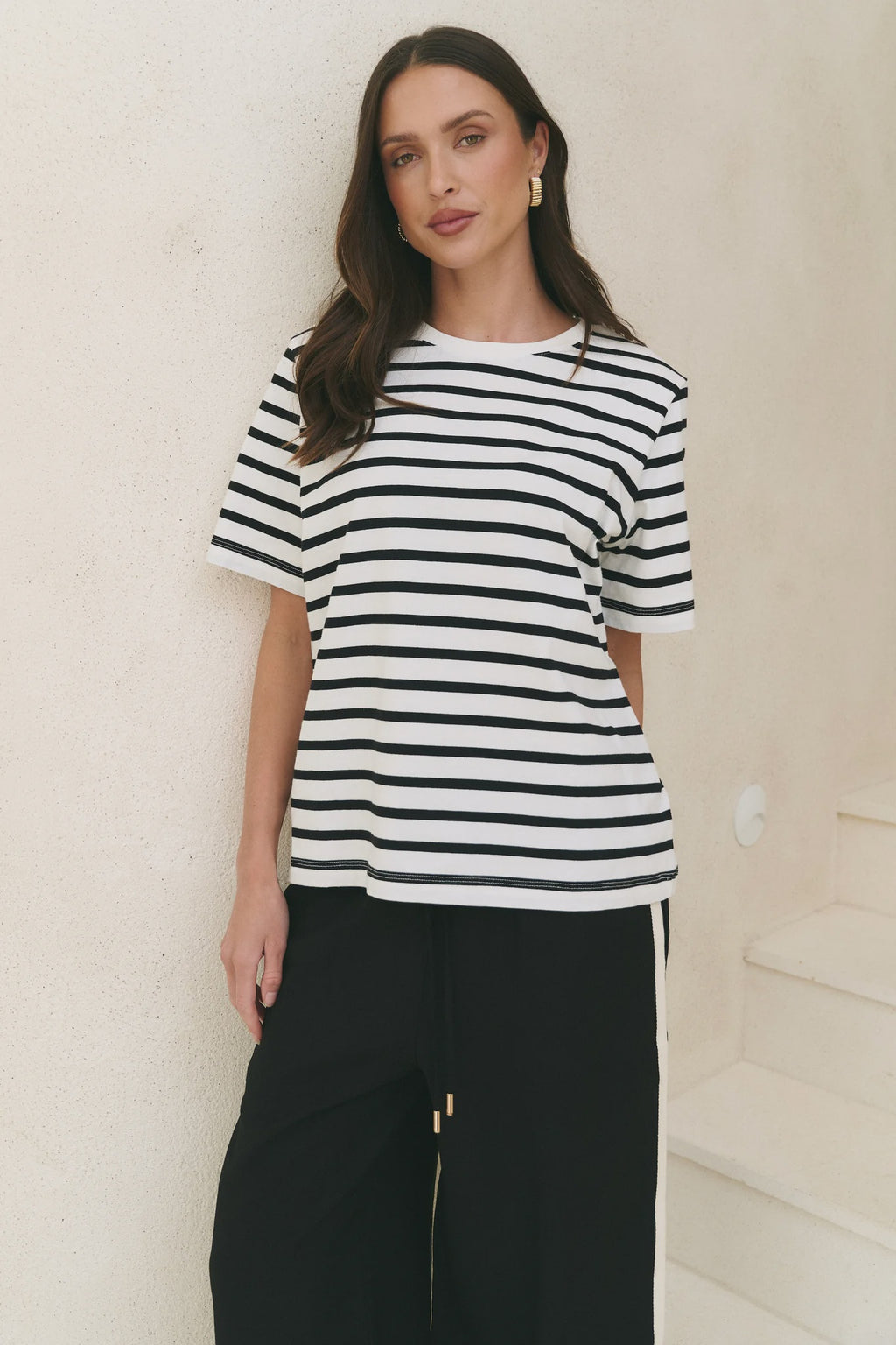 Black and white stripe design

Oversized, boxy fit

Classic crew neckline

Short sleeves

Soft, breathable cotton blend

Comfortable stretch for everyday wear

Fabric Composition
95% Cotton, 5% Elastane