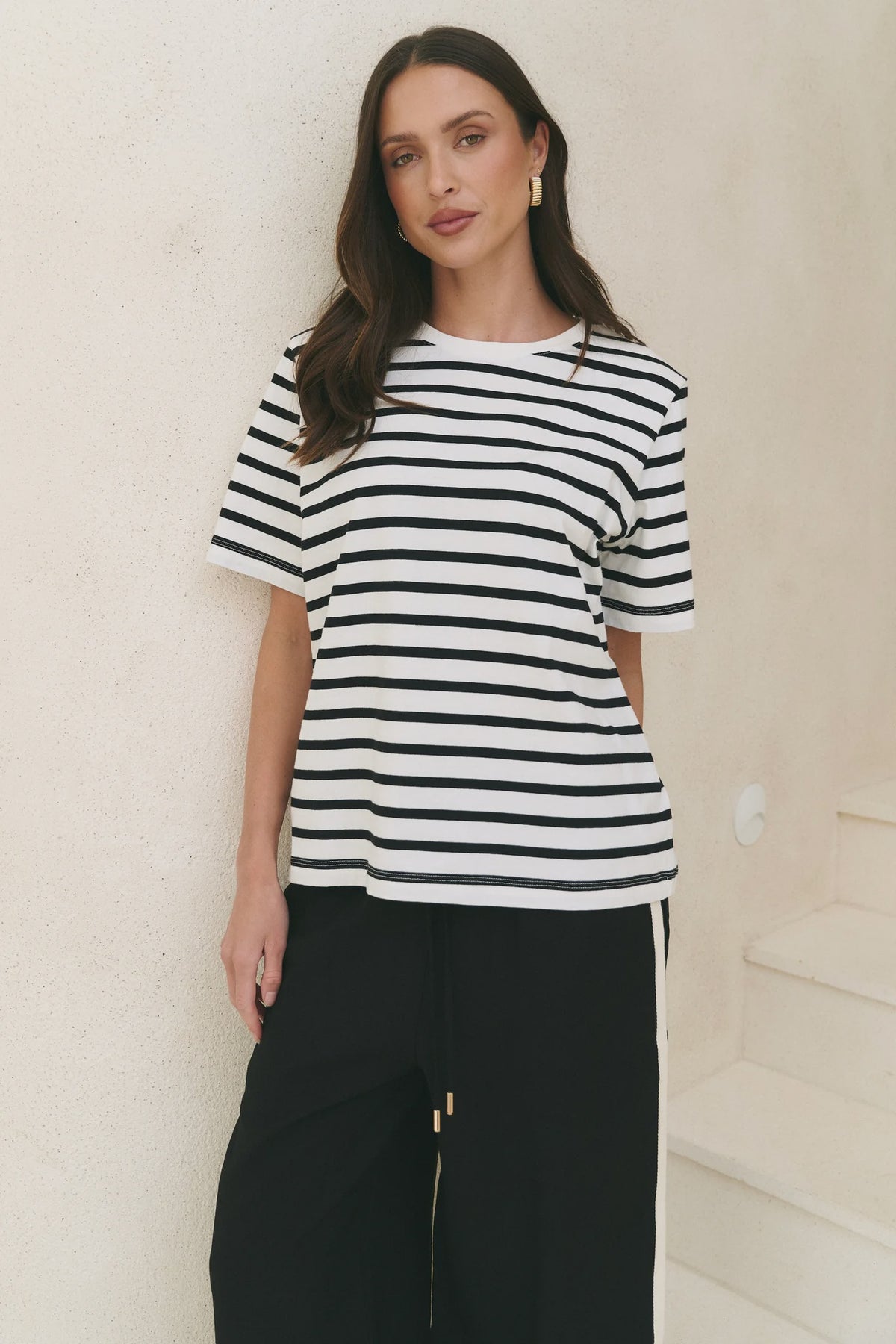 Black and white stripe design

Oversized, boxy fit

Classic crew neckline

Short sleeves

Soft, breathable cotton blend

Comfortable stretch for everyday wear

Fabric Composition
95% Cotton, 5% Elastane