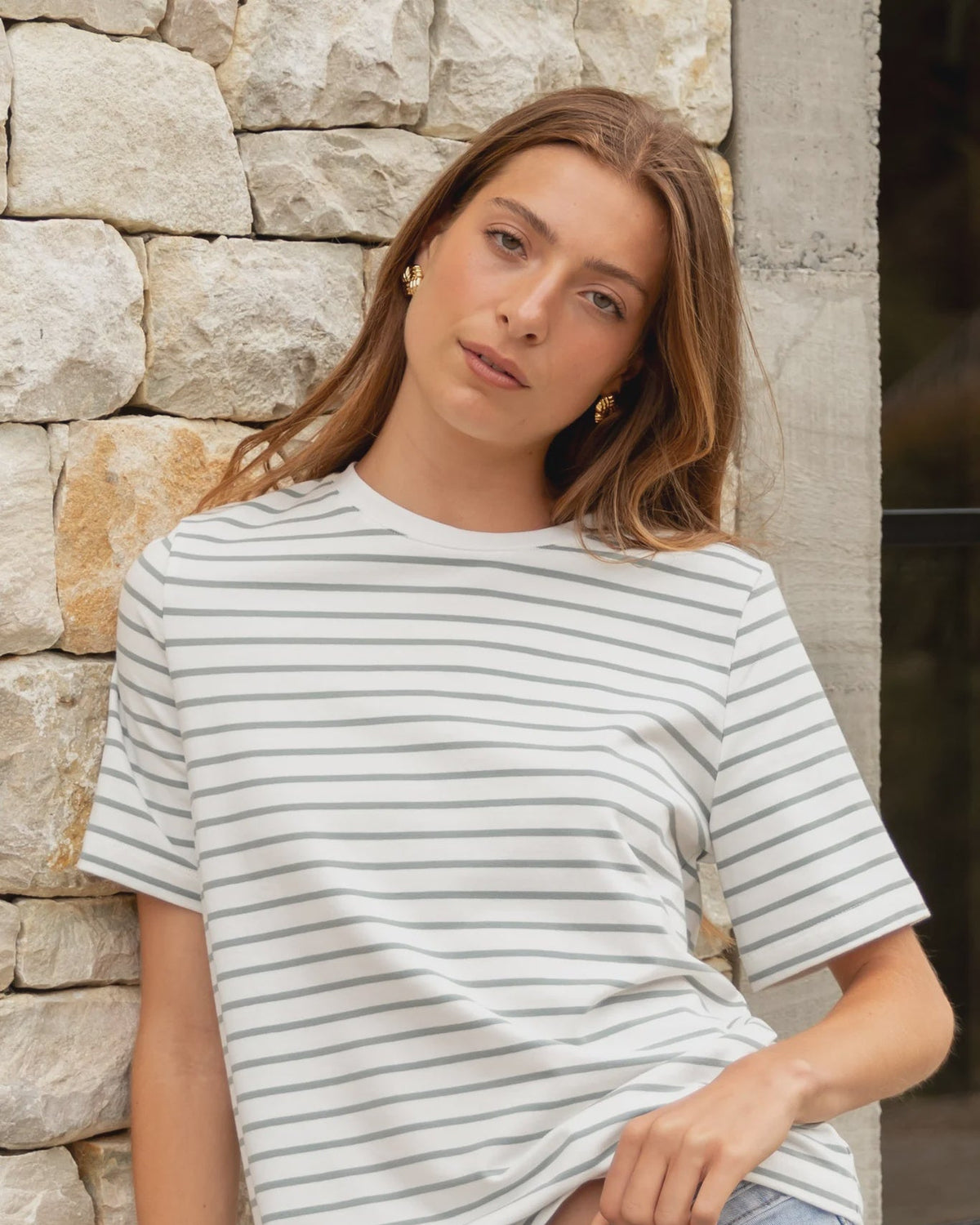 Khaki and white stripe design

Oversized, boxy fit for a modern silhouette

Classic crew neckline

Short sleeves

Soft, breathable cotton blend

Comfortable stretch for everyday wear

Fabric Composition
95% Cotton, 5% Elastane