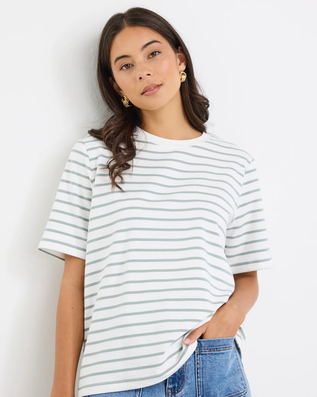 Khaki and white stripe design

Oversized, boxy fit for a modern silhouette

Classic crew neckline

Short sleeves

Soft, breathable cotton blend

Comfortable stretch for everyday wear

Fabric Composition
95% Cotton, 5% Elastane
