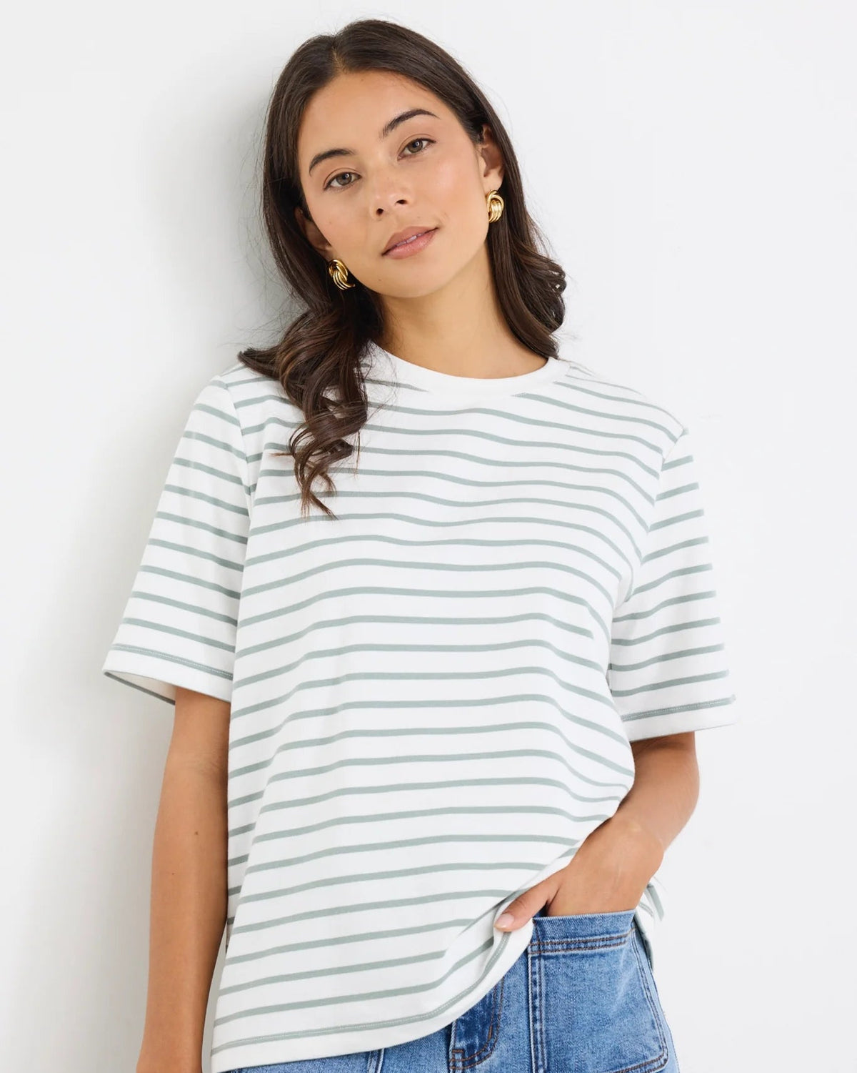 Khaki and white stripe design

Oversized, boxy fit for a modern silhouette

Classic crew neckline

Short sleeves

Soft, breathable cotton blend

Comfortable stretch for everyday wear

Fabric Composition
95% Cotton, 5% Elastane