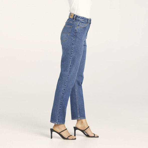 Our best selling Hi Mom sits super high on the waist, with a slim leg that tapers to the hem. The rolled cuff keeps it versatile allowing you to tailor the jean to your own length. Designed to be worn fitted, this jean will soften and shape to the body with wear for an effortless fit. Made in a darker blue, vintage indigo wash with the look of a vintage jean but the added comfort of stretch.